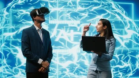 IT experts using artificial intelligence and virtual reality tech Stock Photos