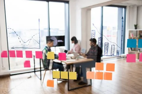 IT experts working on artificial intelligence developments in modern office Stock Photos