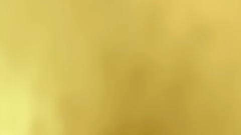 It is a goldcolored blurry textured background. Stock Footage 304420931