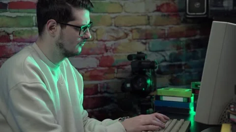 IT Guy From 1990s Working on Desktop PC Computer, Camcorder and VHS 스톡 동영상 303887397
