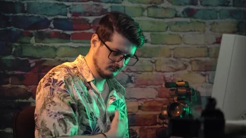 IT Guy Cleaning Up DVD Disk With Breath and Rubbing Inserting in Player in Stock Footage 306142450