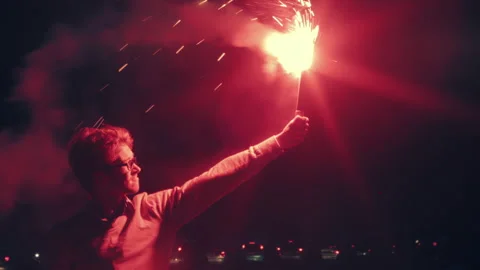 It Guy in Glasses with Fire Torch Glowing Flare Stock Footage 229533414