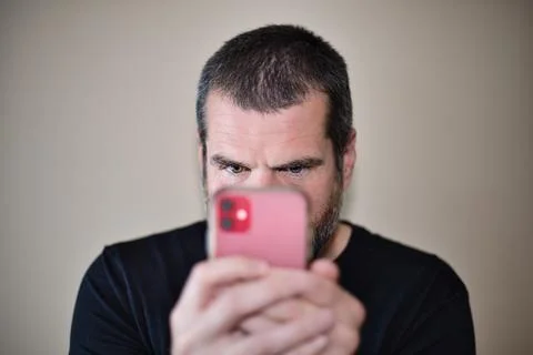 IT Guy on Smartphone Foto stock
