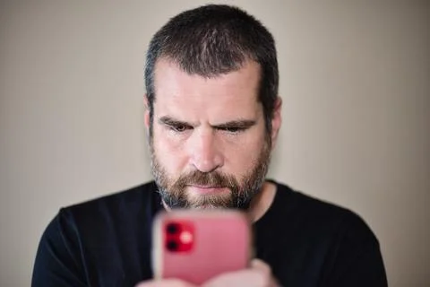 IT Guy on Smartphone Stock Photos