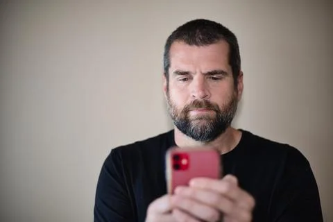 IT Guy on Smartphone Foto stock
