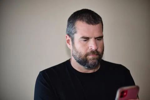 IT Guy on Smartphone Foto stock