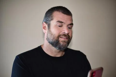 IT Guy on Smartphone Stock Photos