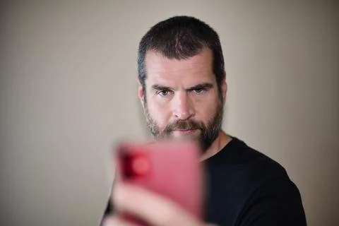 IT Guy on Smartphone Foto stock