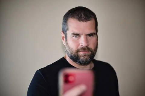 IT Guy on Smartphone Foto stock