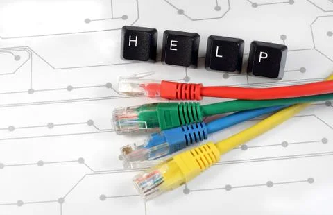 IT help, assistance, network cables circuit board background Stock Photos