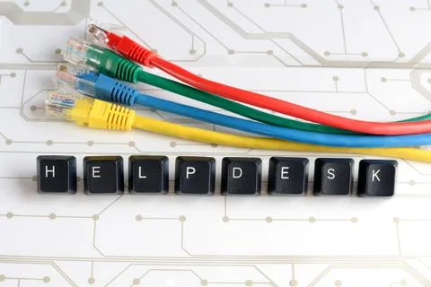IT help desk assistance network cables circuit board background Foto stock