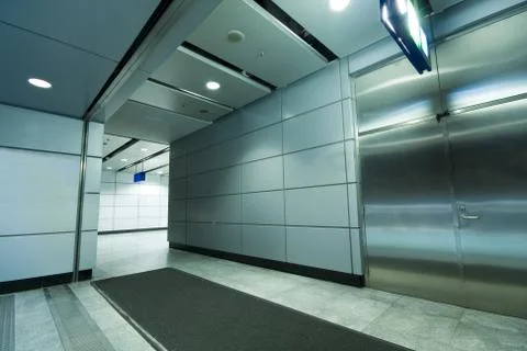 It is a long passageway in building Stock Photos