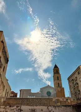 It looks like a cloud comes out of a church Stock Photos