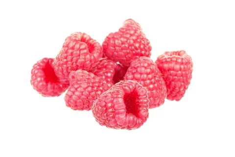 It is a lot of berries of a raspberry on a white background, it is isolated Stock-Fotos