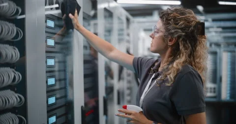 IT Maintenance Crew Cleaning Server Rack Glass in Data Center Stock Footage 344882764