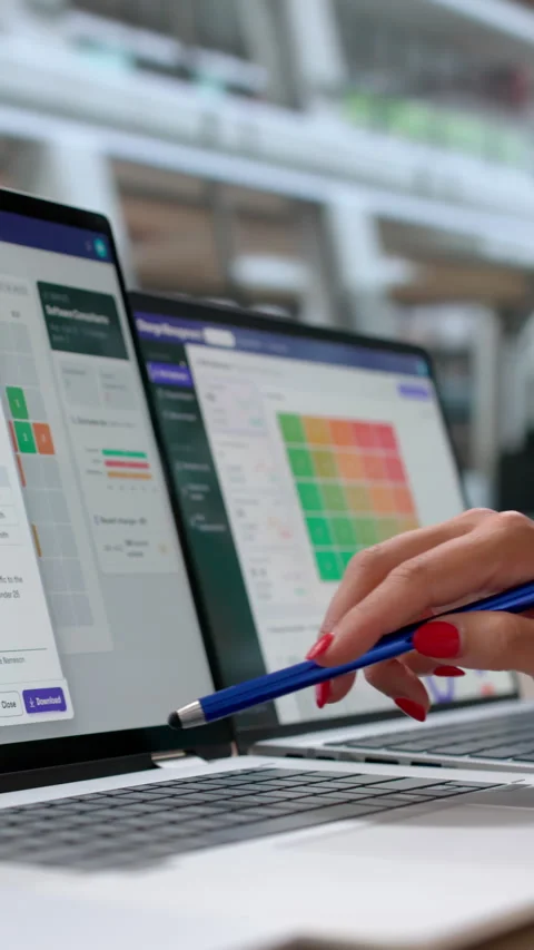 IT Manager Reviews Change Request Workflow On Laptop Stock Footage 342972276