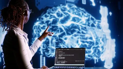 IT manager writing AI script Stock Photos
