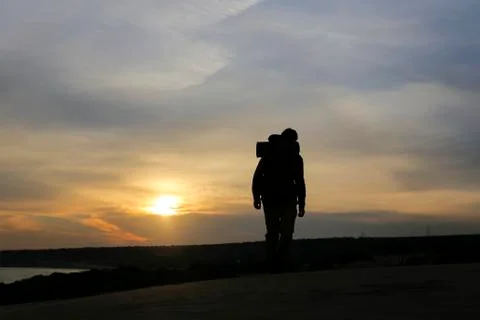 It is a mans world with sunset Stock Photos