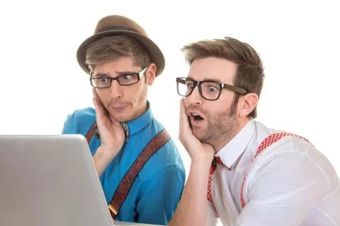 IT nerds looking at laptop computer Stock Photos