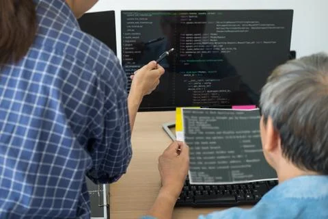 IT office Programmers software development coding technologies On Computer wo Stock Photos