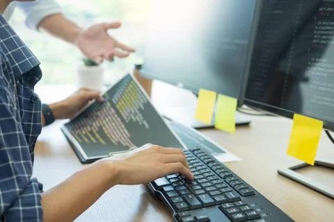 IT office Programmers software development coding technologies On Computer wo Stock Photos