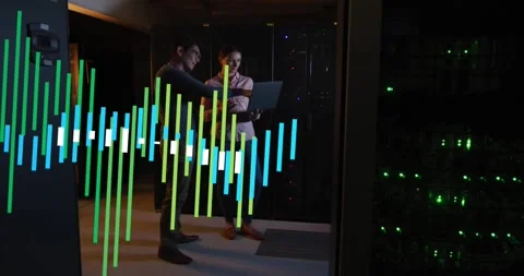IT pair checking laptop in rack aisle, laptop data sparking bars crossing Stock Footage 331820744