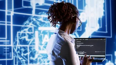IT practitioner updating AI systems 스톡 사진