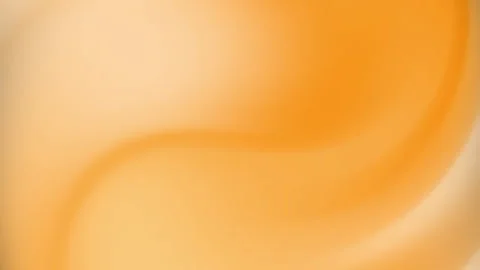 It presents a smooth orange gradient with subtle swirling patterns. Stock Footage 308785570