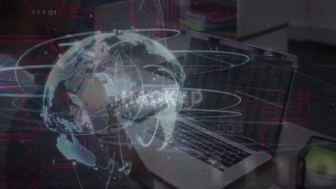 IT pro at desk watching laptop while globe appearing and HACKED signaling Stock Footage 334013864