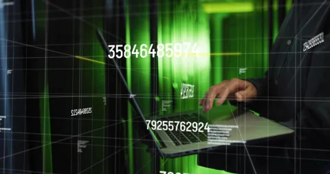 IT pro typing laptop keyboard and generating numeric code processing data within Stock Footage 313704396