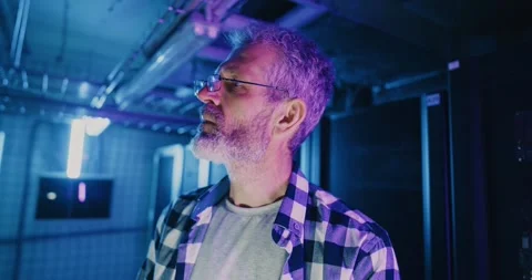 IT Professional Checking Neon Cell Phone Stock Footage 280048644