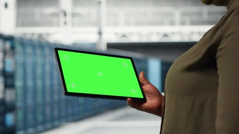IT professional in data center using green screen tablet Stock Footage 317201158