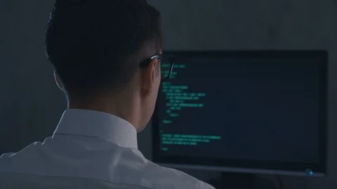 IT Professional Programmer man is typing code. Developer at work at computer Video stock 106209046