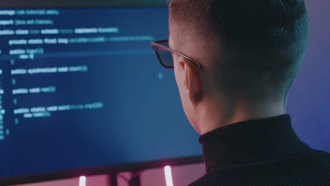 IT Professional Programmer man is typing code. Developer at work at computer Stock Footage 139662172