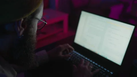 IT Professional Programmer man is typing code. Developer at work at computer Stock Footage 236486107