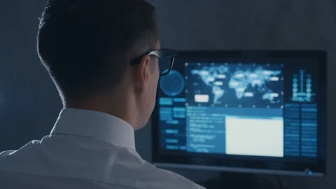 IT professional programmer is working on computer in cyber security center Stock Footage 106213333