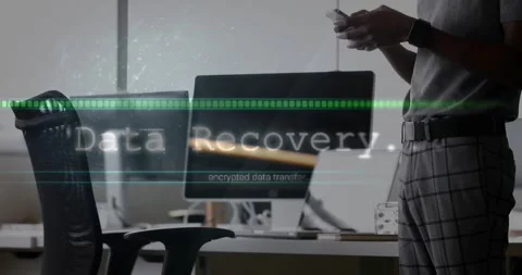 IT professional tapping smartphone, initiating animated data recovery progress Stock Footage 327280793