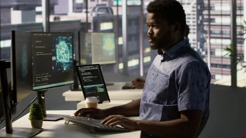 IT professional working with AI tech to transform data into predictive models Stock Footage 318160935