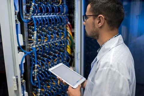 IT Professional Working with Supercomputer Foto stock