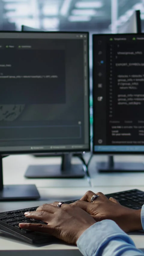 IT professional writing code, safeguarding data center from unauthorized access Stock Footage 319555568