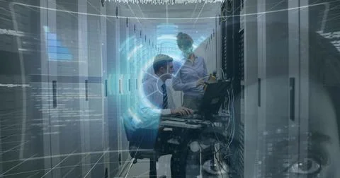 IT professionals typing and examining network cables in data center aisle, with Stock Photos
