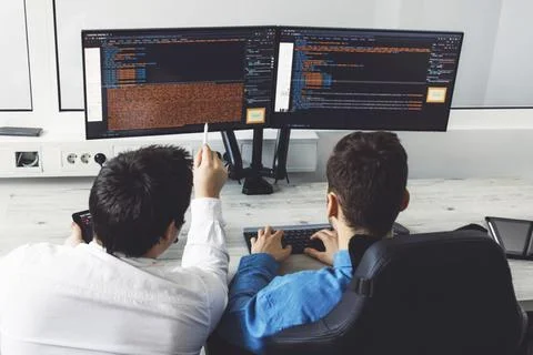 IT Programmer Working on Desktop Computer. Male Specialist Creating Innovative Stock Photos
