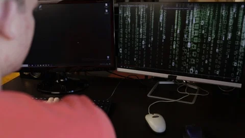 IT Programmer works at the computer typing code Stock Footage 121473093