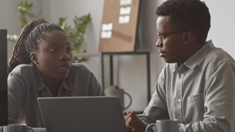 IT Programmers Chatting at Workplace Stock Footage 162265829