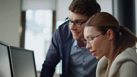 It programmers discussing project in office closeup. Hands typing computer code Stock Photos
