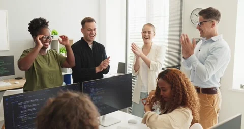IT programmers team celebrating code success with applause in modern office 스톡 동영상 337709184