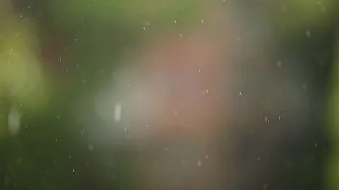 It is raining on a blurred background. Stock Footage 153047925