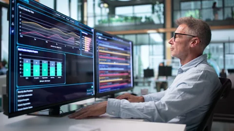 IT Security Specialist Carefully Monitors Network Stock-Footage 344711371
