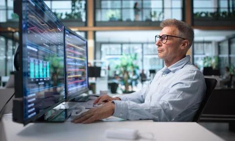 IT Security Specialist Scans Network Data For Real-time Cyber Threat Detectio Stock Photos