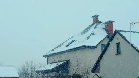 It is snowing in front of the house. Selective focus. Stock Footage 169482157